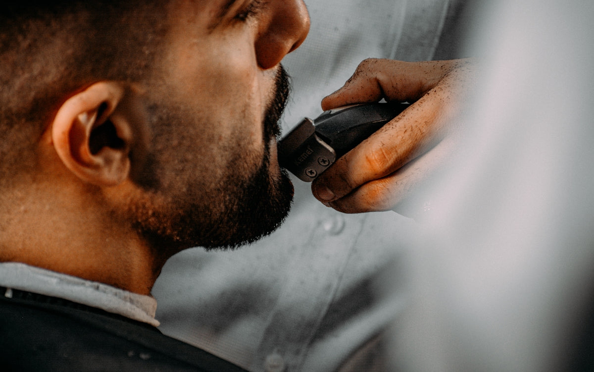 a man with a beard and mustache Image